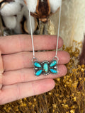 Butterfly cluster necklace